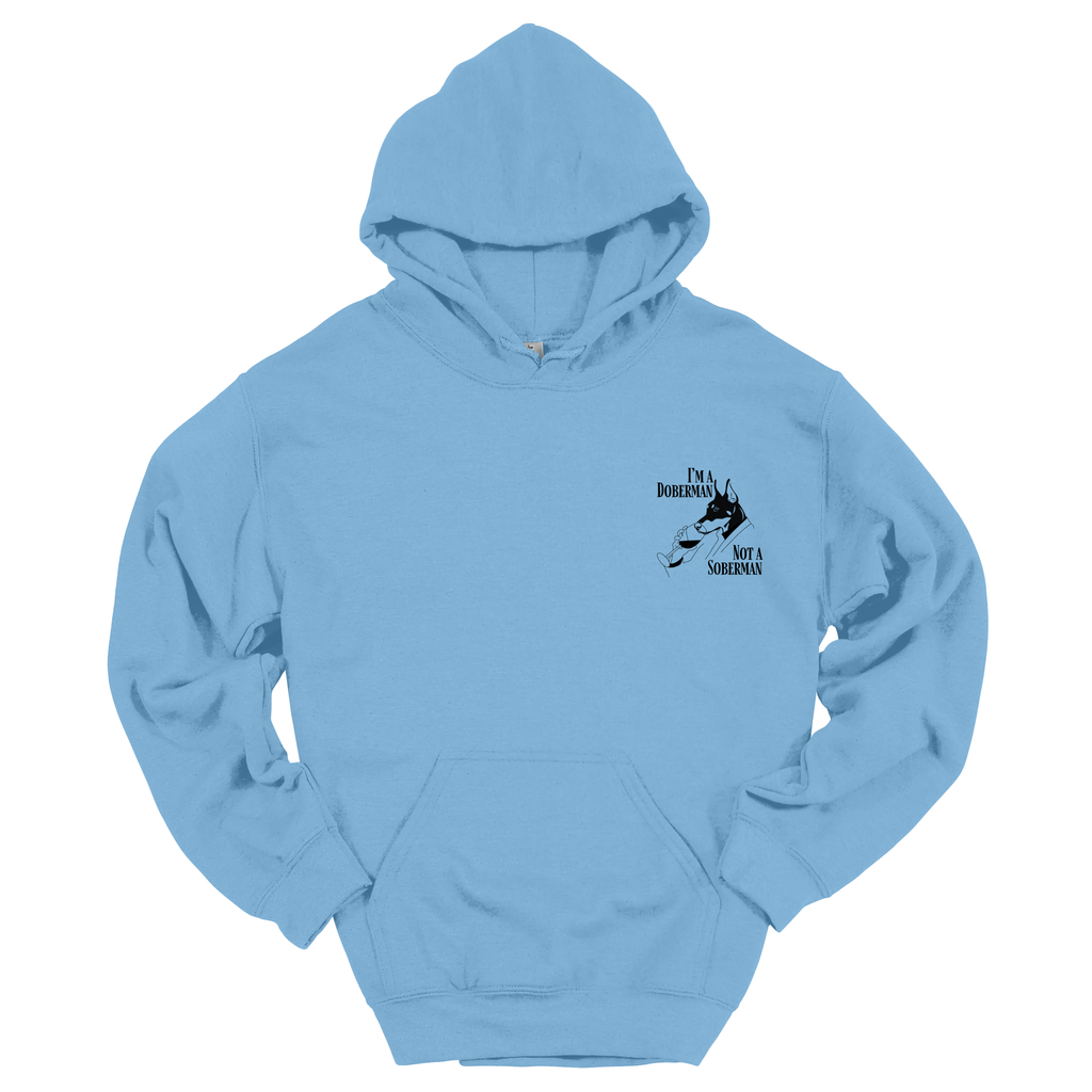 Hellblauer Hoodie mit kleinem schwarzen Frontprint „I’m a Doberman, Not a Soberman“ und Dobermann-Illustration; Produktfoto vor weißem Hintergrund.